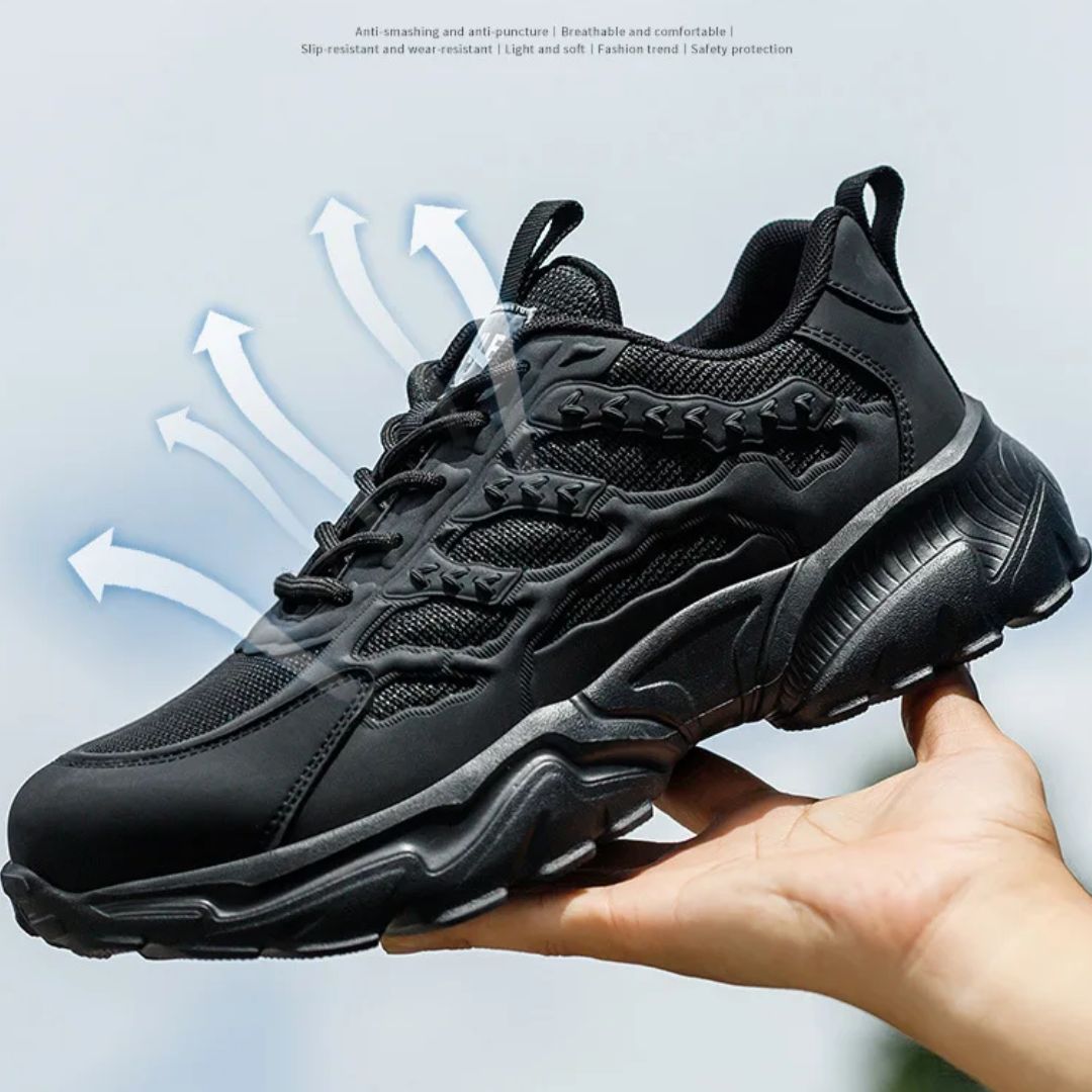 "Onverwoestbare zwarte werksneakers met stalen neus, anti-plet, flexibele zool, ideaal voor bescherming en comfort."