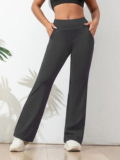 Elastische dames sportbroek, flared legging met hoge taille en handige zakken. Perfect voor yoga.