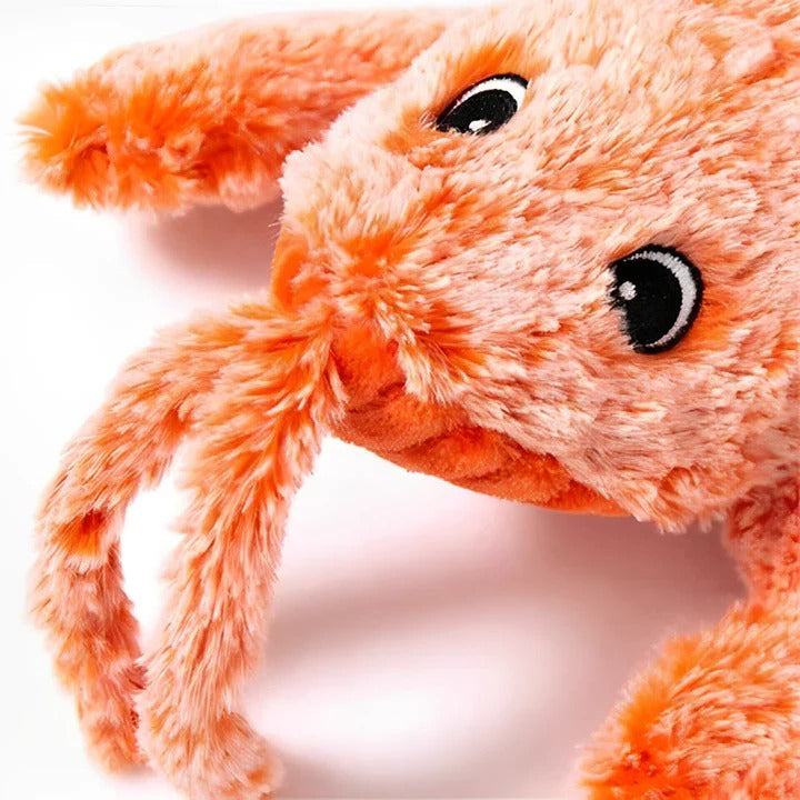 Colorful interactive dog toy shaped like a floppy lobster with motion activation features