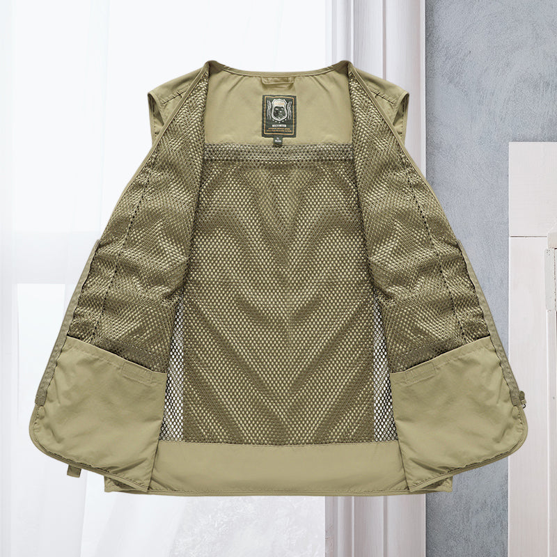 "Lichtgewicht ademend outdoorvest met meerdere zakken, ideaal voor wandelen en kamperen. Stijlvol en functioneel ontwerp."